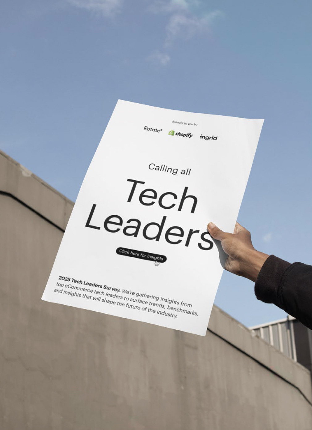 Tech Leaders Survey poster held up against the sky