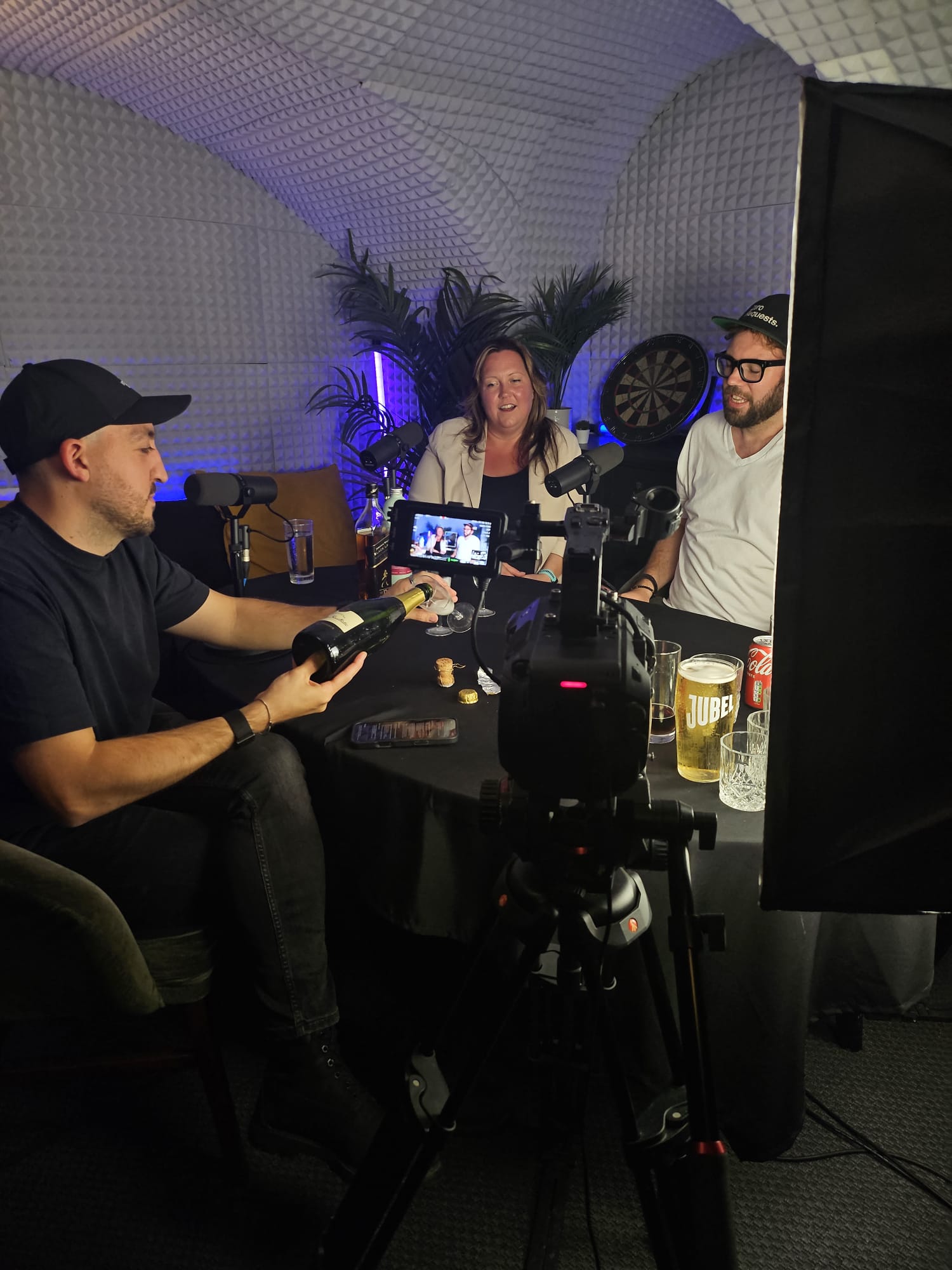 Open Tabs filming with guest pouring champagne